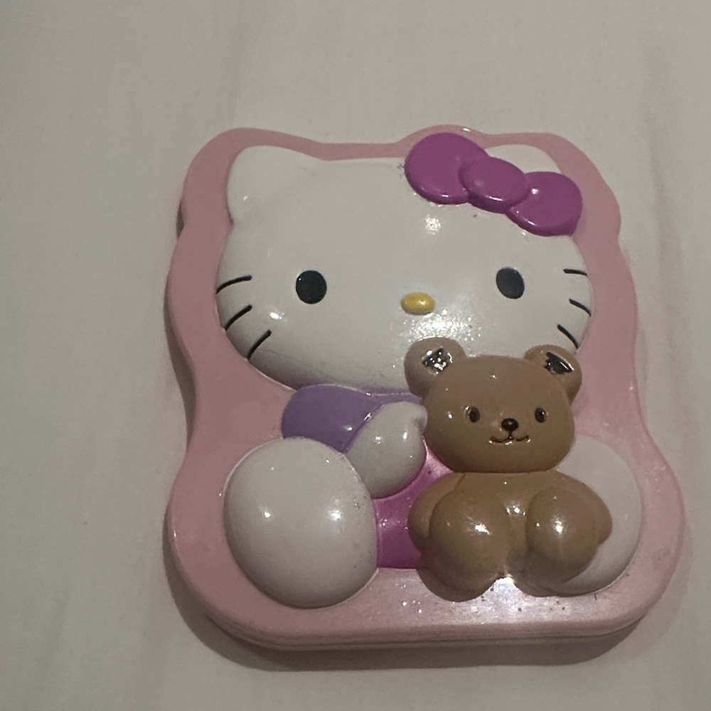 NWOT Hello Kitty Pink and Purple compact mirror with comb.
